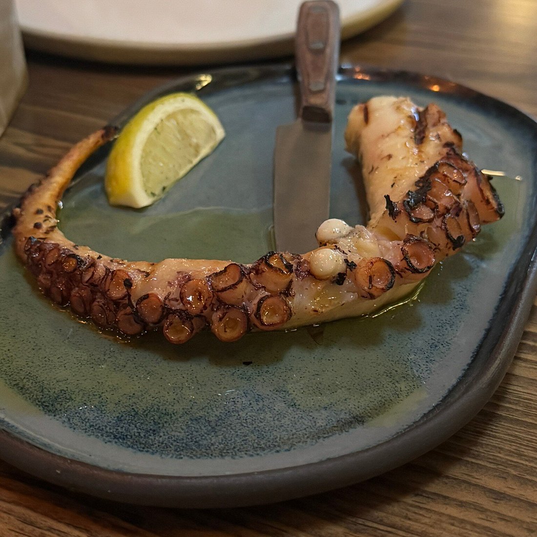 DOYA signature dishes Doya Octopus, Pide with Truffle, Doya Eggplant.